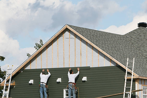 Professional Siding Replacement technician working in Seaford, NY